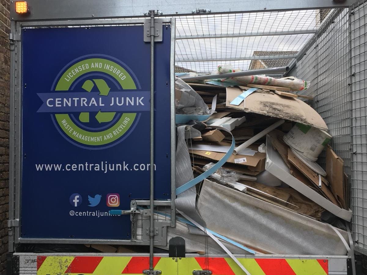 an example of rubbish removal truck recycling
