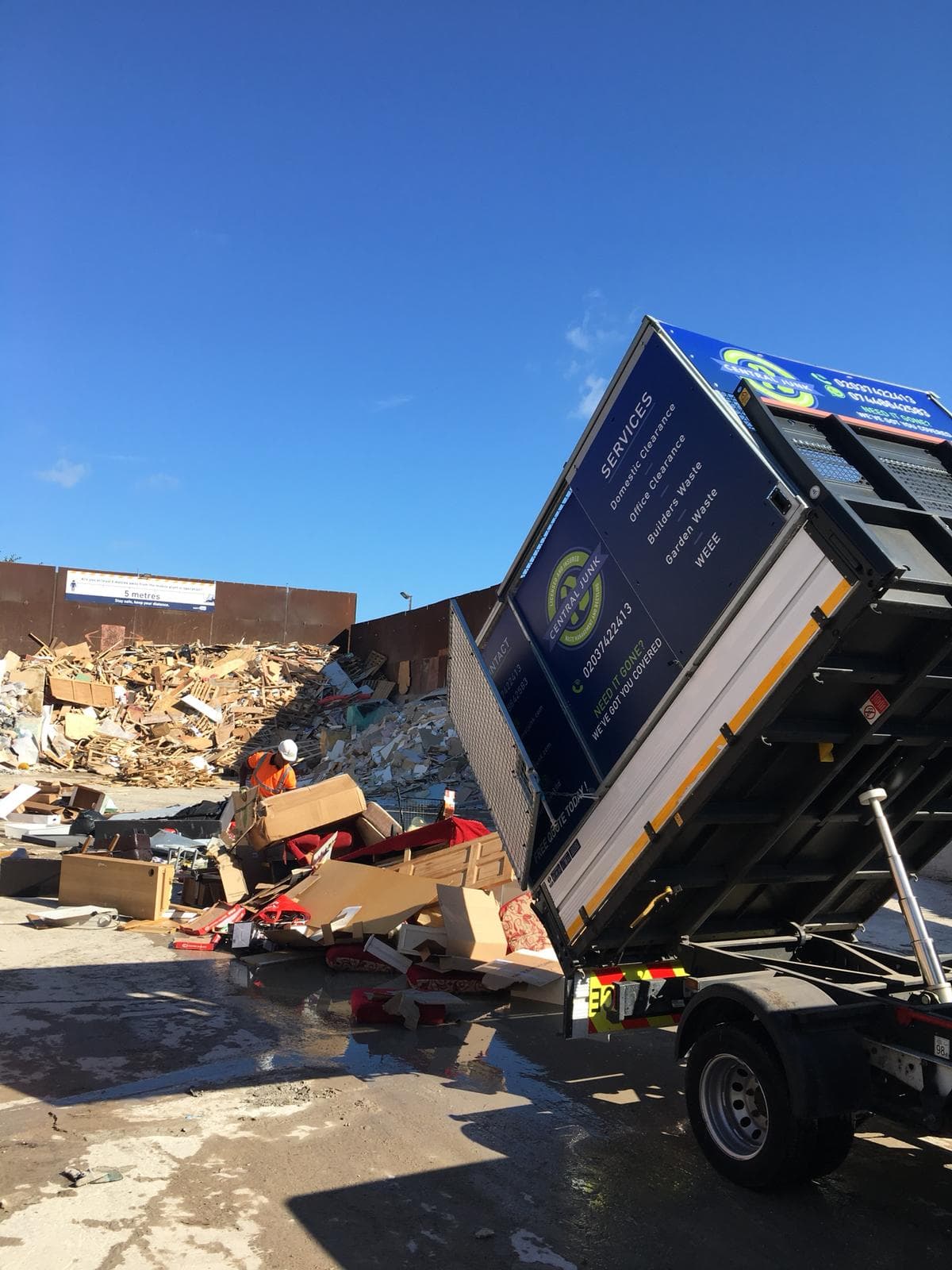 an example of a central junk removal truck recycling waste nationwide