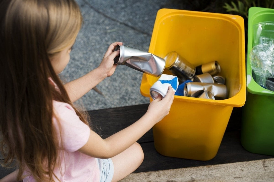 A girl sorting the recyclable rubbish