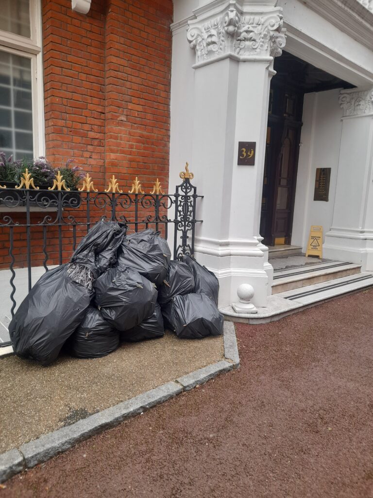 image of black bin bags ready for collection
